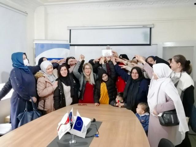 MD. Zakira Hekmat presents the 'Woman of the Year' award to women and girls in Afghanistan